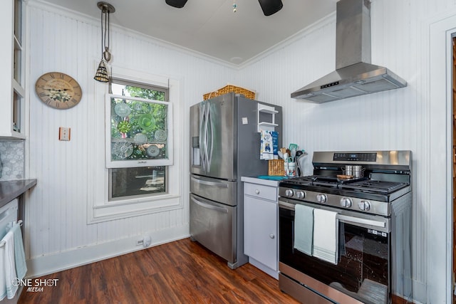 kitchen featuring ceiling fan, crown molding, wall chimney exhaust hood, dark hardwood / wood-style floors, and appliances with stainless steel finishes