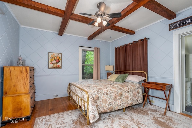 bedroom featuring beamed ceiling, wood-type flooring, coffered ceiling, and tile walls