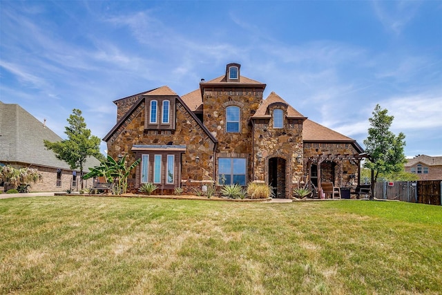 view of front of house with a front lawn