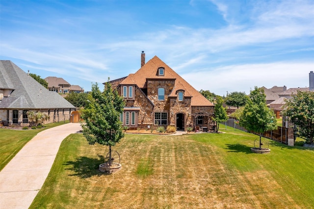 tudor house with a front lawn