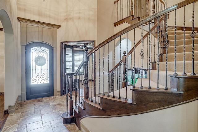 entryway with ceiling fan