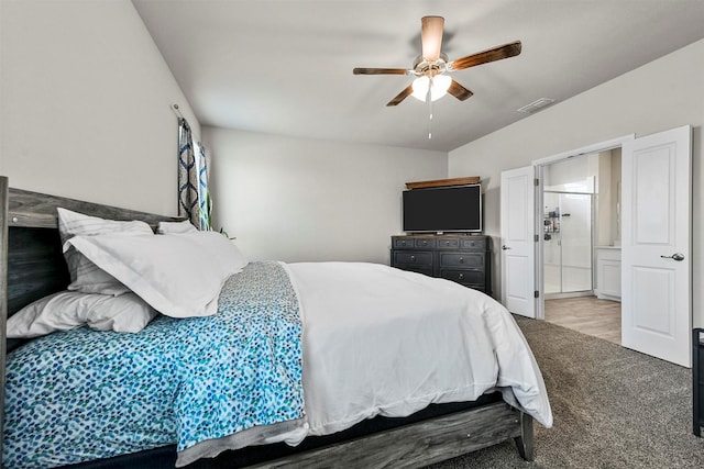 bedroom featuring ceiling fan, carpet floors, and ensuite bathroom