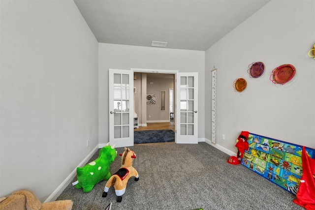 playroom with french doors and carpet floors