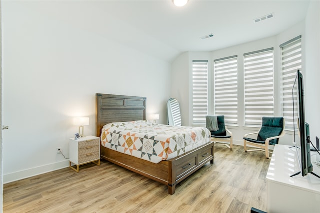 bedroom featuring light hardwood / wood-style floors