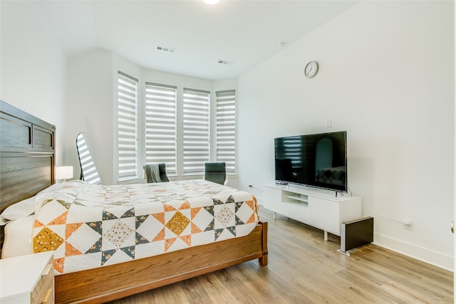 bedroom featuring light hardwood / wood-style floors