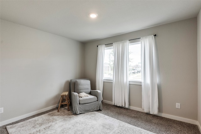 living area with carpet flooring