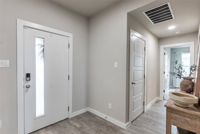 foyer entrance featuring light wood-type flooring