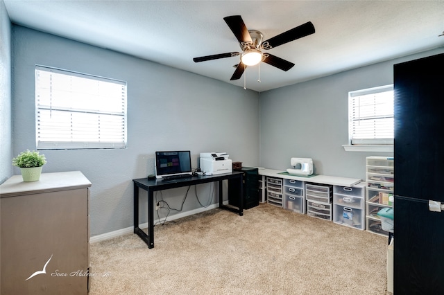 carpeted office with ceiling fan