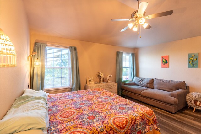 bedroom featuring wood-type flooring and ceiling fan