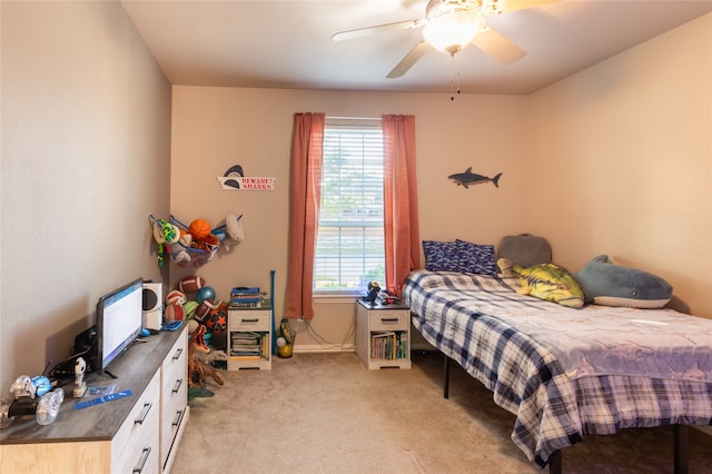 carpeted bedroom with ceiling fan