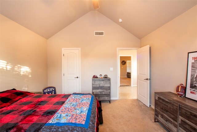 bedroom with light carpet, high vaulted ceiling, and ceiling fan