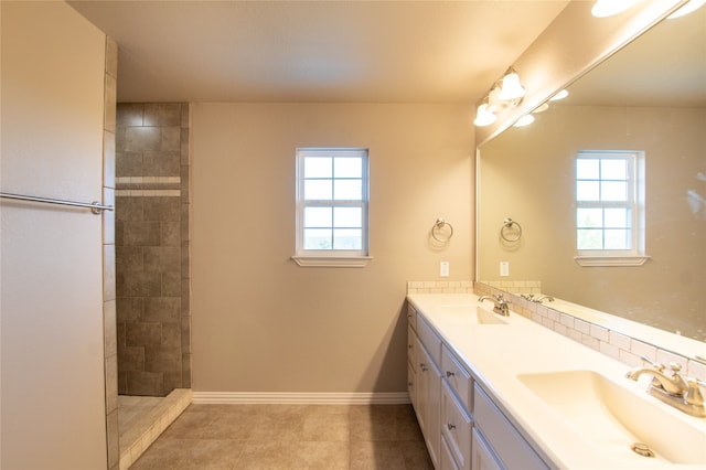 bathroom featuring dual vanity and tile patterned flooring