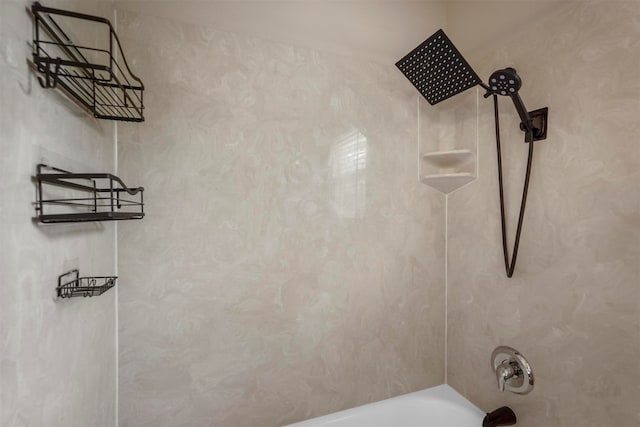 interior details featuring shower / bath combination