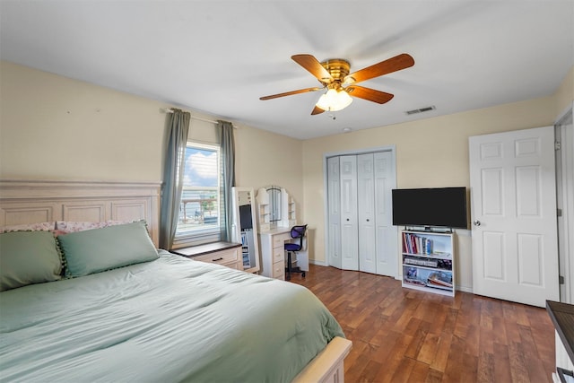 bedroom with a closet, hardwood / wood-style floors, and ceiling fan