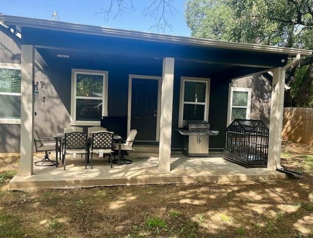 rear view of house with a patio