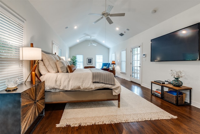 bedroom featuring multiple windows, dark hardwood / wood-style floors, access to outside, and vaulted ceiling