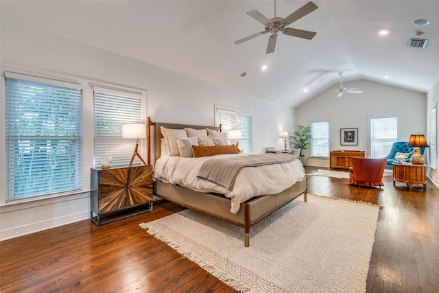 bedroom with dark hardwood / wood-style flooring, lofted ceiling, and ceiling fan