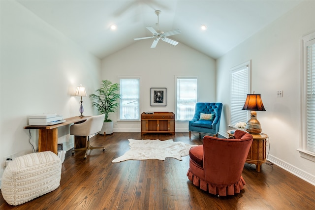 living area with hardwood / wood-style flooring, high vaulted ceiling, and ceiling fan