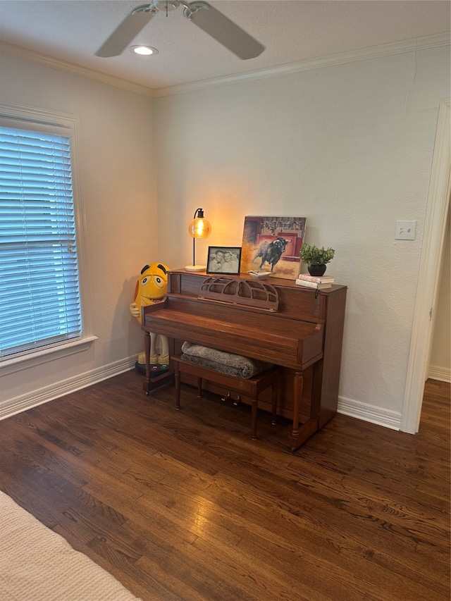 misc room with crown molding, hardwood / wood-style floors, a wealth of natural light, and ceiling fan