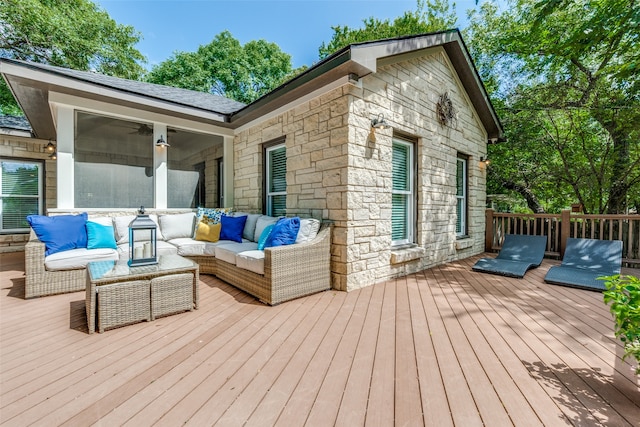 wooden terrace with outdoor lounge area