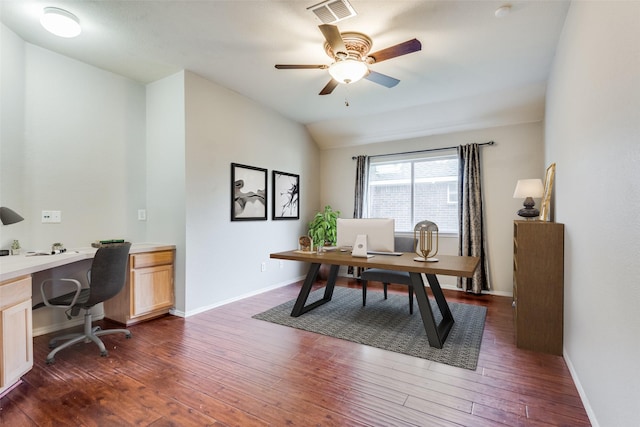 home office with dark wood-type flooring, ceiling fan, and lofted ceiling