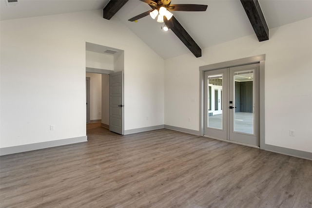 empty room featuring ceiling fan, light hardwood / wood-style floors, beam ceiling, and french doors