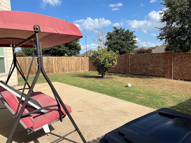 view of yard with a patio area