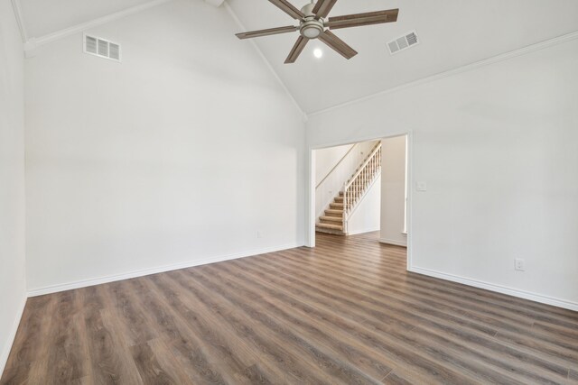 spare room featuring ceiling fan, crown molding, dark hardwood / wood-style flooring, and high vaulted ceiling