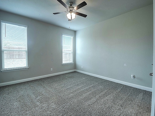 carpeted empty room with ceiling fan