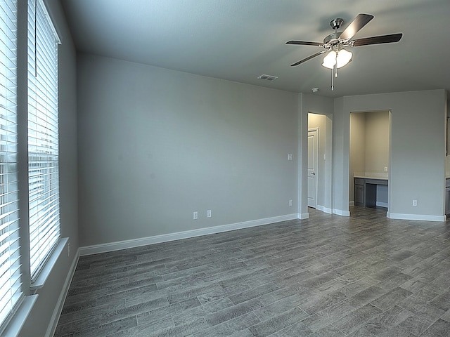 spare room with ceiling fan