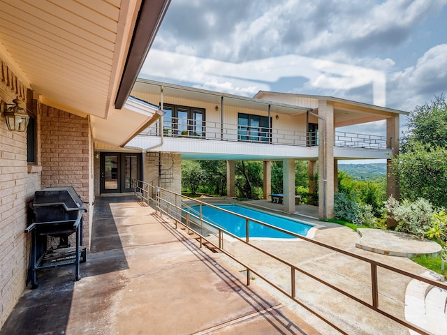 view of pool with a patio area