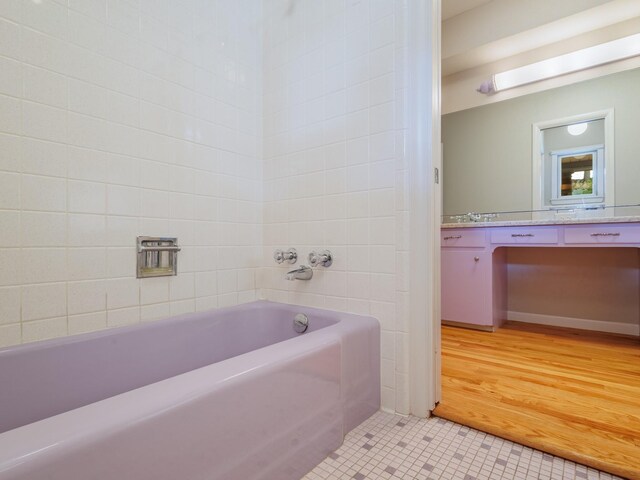 bathroom with tile patterned floors