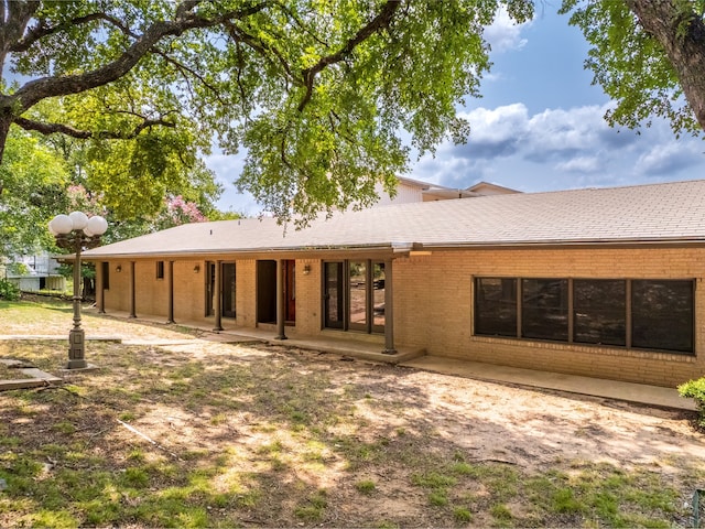 rear view of property with a patio