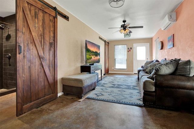 living room featuring a wall mounted air conditioner, concrete flooring, a barn door, and ceiling fan