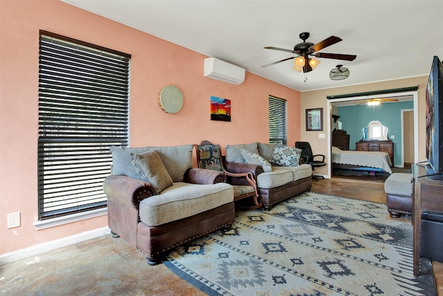 living room with ceiling fan and a wall unit AC