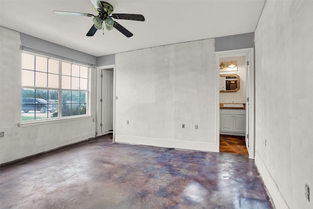 empty room featuring sink and ceiling fan