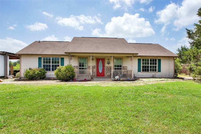 ranch-style house with a porch and a front lawn