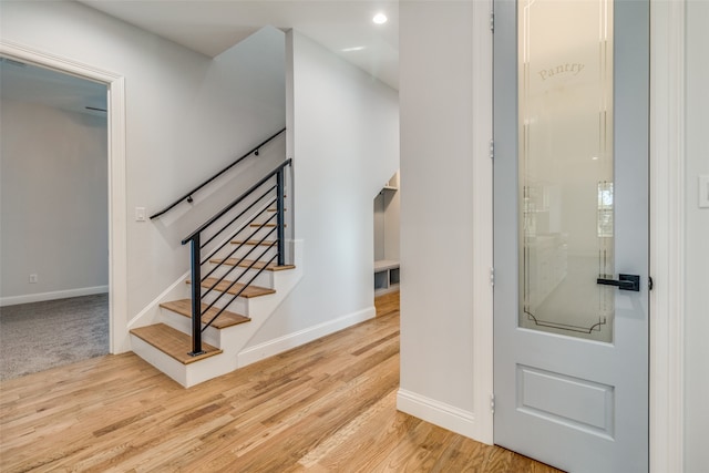 unfurnished room with light hardwood / wood-style flooring and ceiling fan