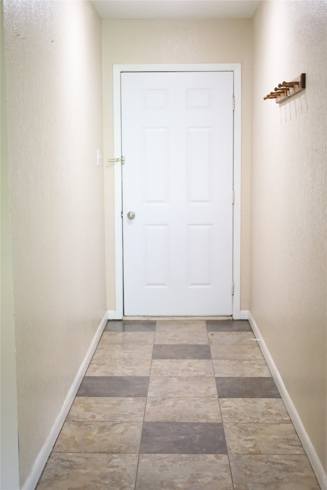 interior space with tile patterned floors