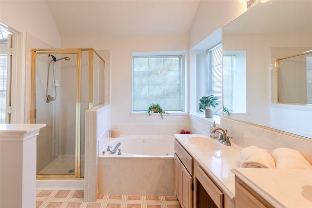 bathroom featuring separate shower and tub, a textured ceiling, vanity, and vaulted ceiling