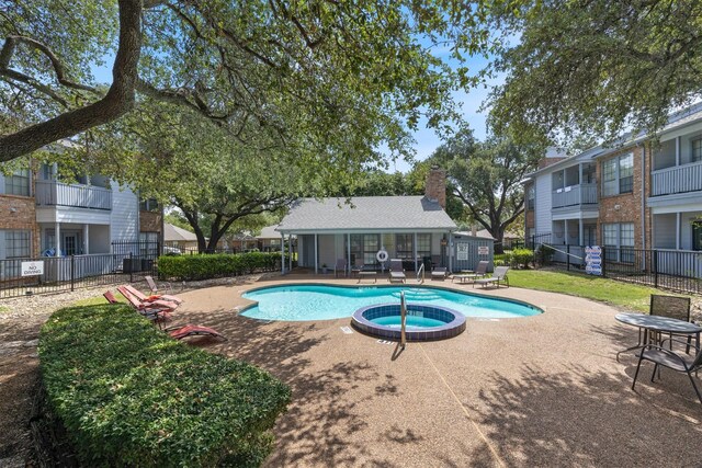 view of swimming pool featuring a patio