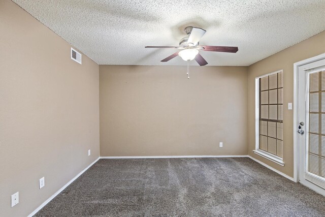 empty room with carpet, a textured ceiling, and ceiling fan