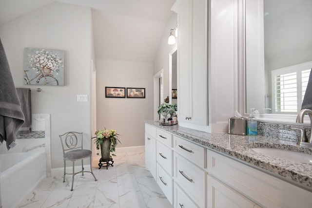 bathroom featuring a bathing tub, tile patterned flooring, double vanity, and vaulted ceiling