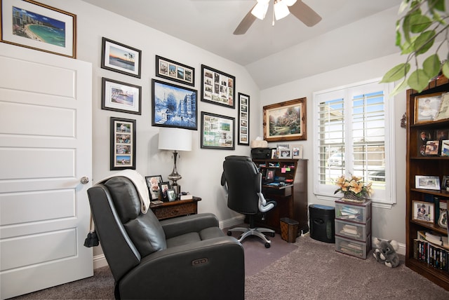 carpeted office with ceiling fan and vaulted ceiling