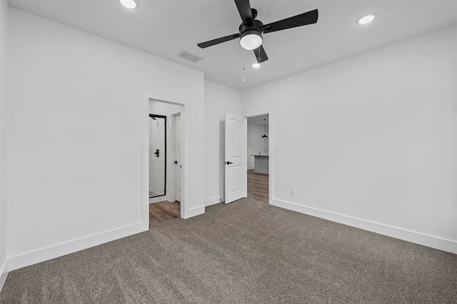 unfurnished bedroom with ceiling fan and carpet flooring