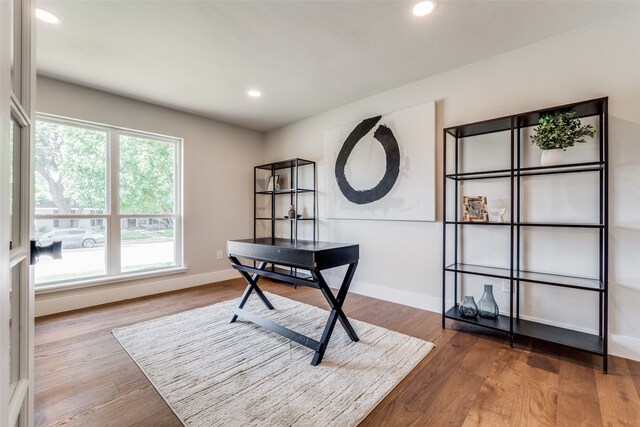 office area with hardwood / wood-style flooring