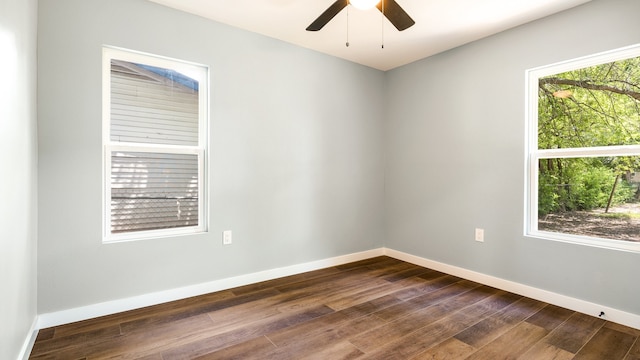 empty room featuring hardwood / wood-style flooring and ceiling fan