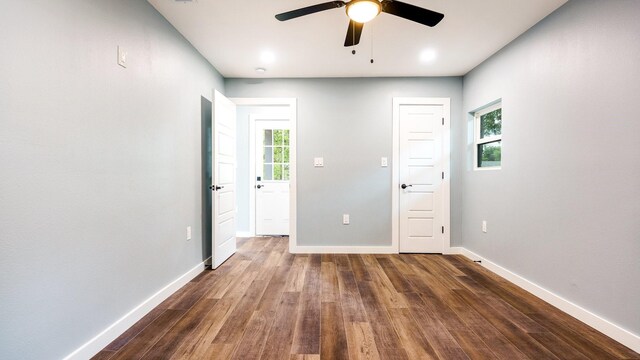 unfurnished bedroom featuring ceiling fan and hardwood / wood-style floors