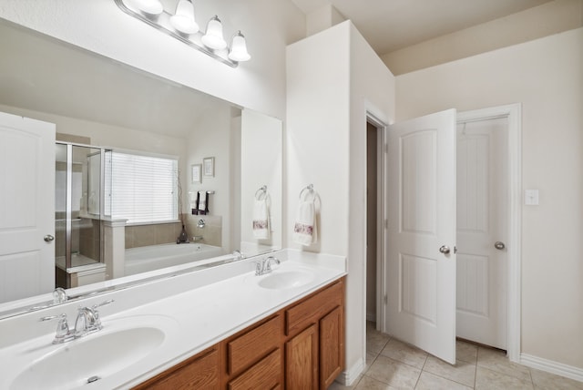 bathroom featuring tile patterned floors, vanity, and independent shower and bath