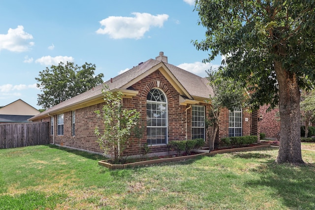 exterior space with a front lawn